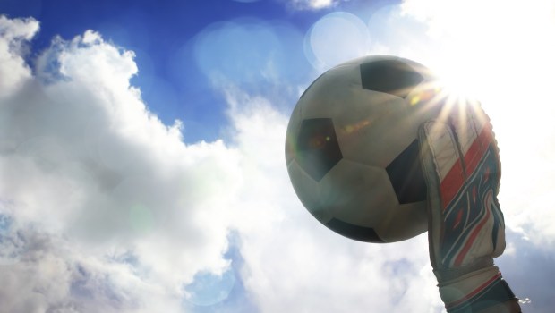Goalkeeper collecting ball