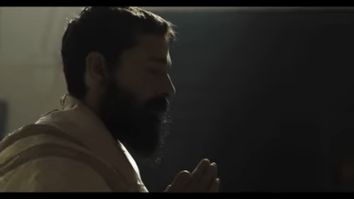 PRIEST PRAYING
