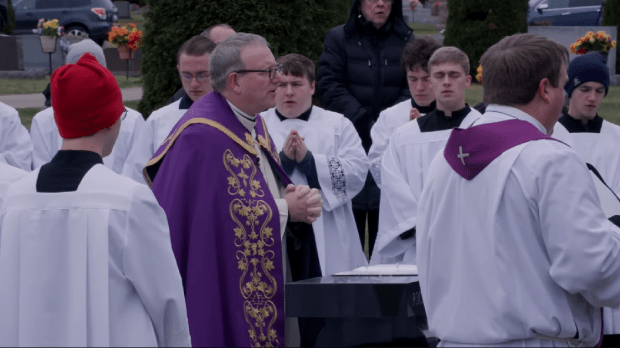 Bishop Robert Barron reconsecrates cemetery in his diocese that was vandalized on Halloween night.