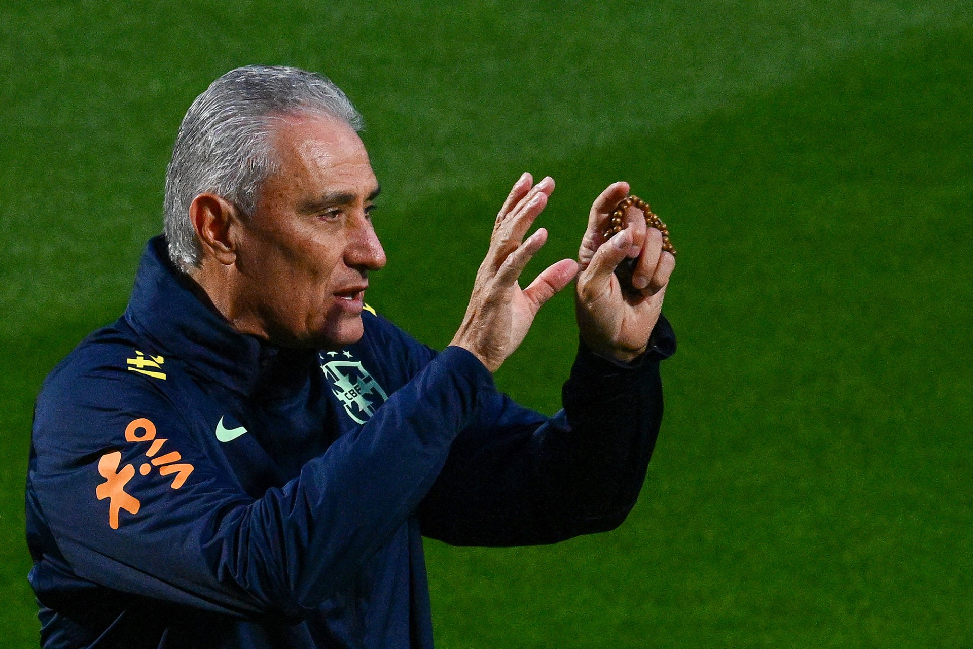 Brazils-football-coach-Adenor-Leonardo-Bacchi-Rosary in Hand