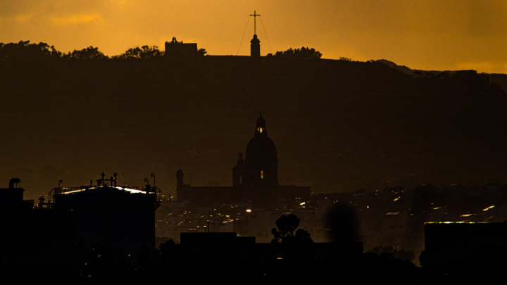 Cross-and-Annunciation-Hill-towering-over-Siggiewi-�-Courtesy-of-Ian-Noel-Pace.png