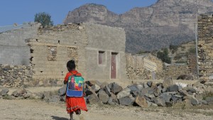 GIRL WALKS PAST DESTRUCTION IN TIGRAY, ETHIOPIA