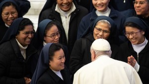 Pope Francis meets with nuns at the end of his weekly general audience in Paul VI Hall