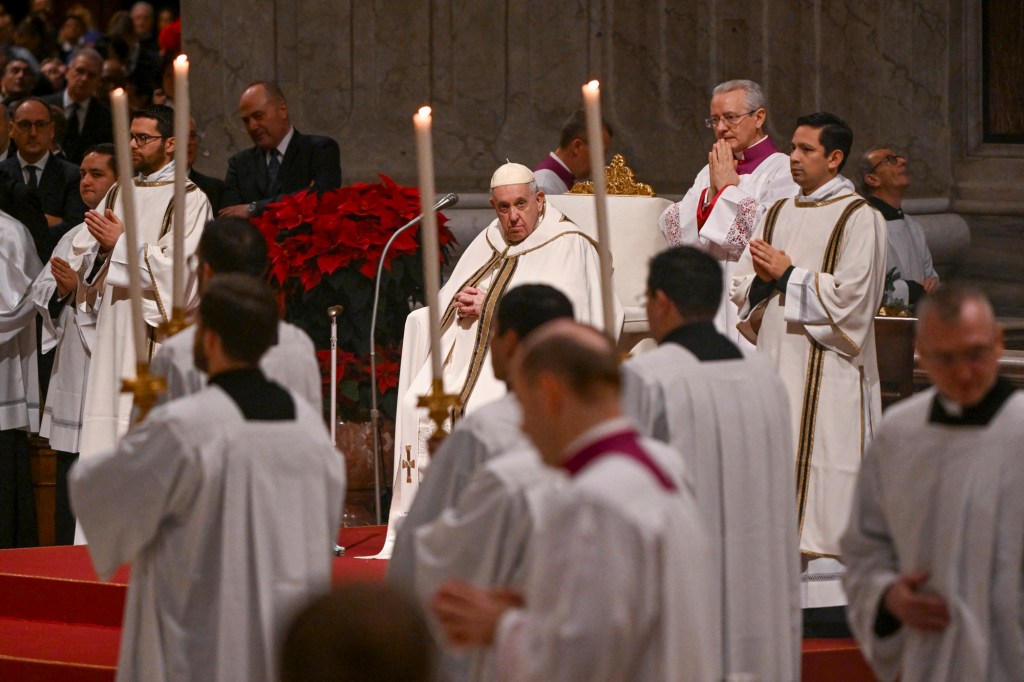 Pope Francis attends the Christmas Eve mass-AFP