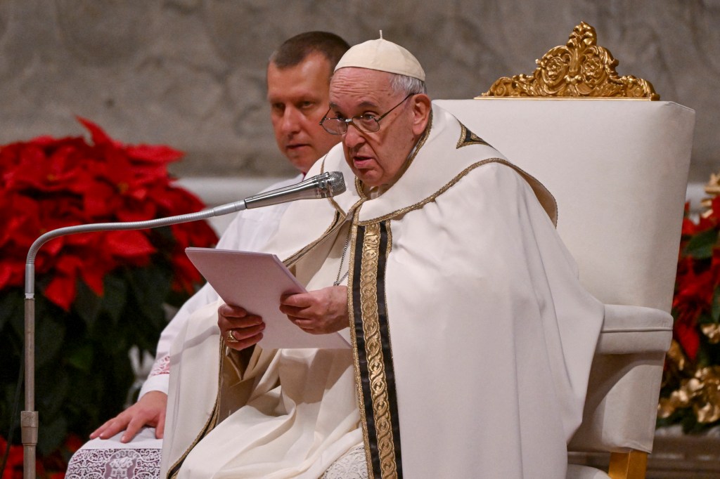 Pope Francis attends the Christmas Eve mass-AFP