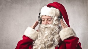 Santa listening to music