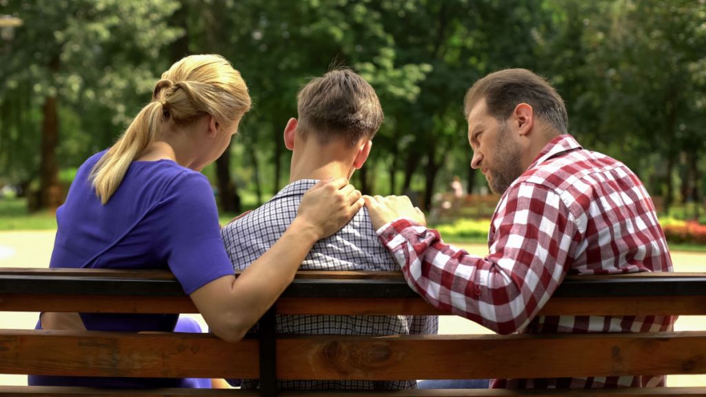 parenting-boy-teen-parents-talking_Shutterstock_1318011395.jpg