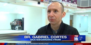 Skateboarding friar wheels in the word for Catholic Schools Week