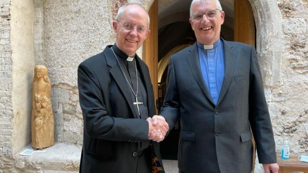 Moderator of the Church of Scotland shakes hands with the Archbishop of Canterbury