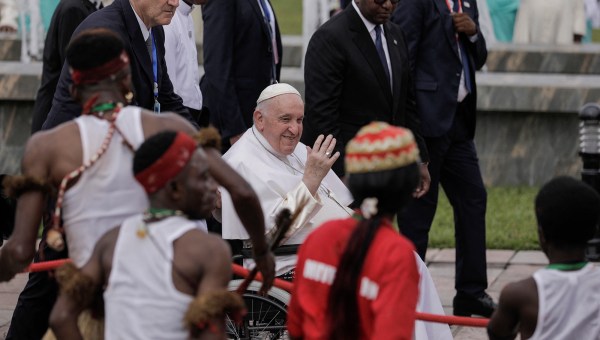 Pope-Francis-seated-on-a-wheelchair-waves-as-he-arrives-at-the-Ndjili-International-Airport-in-Kinshasa-AFP