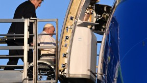 Pope Francis seated on a wheelchair is lifted on a platform to board his plane on January 31, heading to Democratic Republic of Congo and South Sudan.