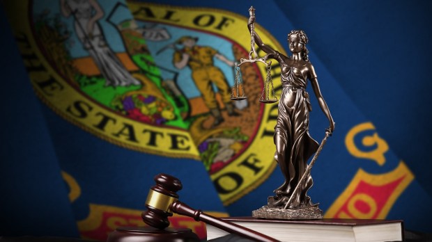 Idaho state flag justice scales