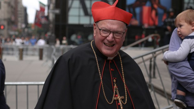 Cardinal Dolan smiling at public event