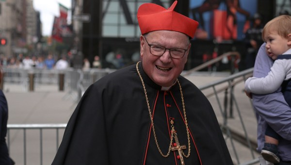 Cardinal Dolan smiling at public event