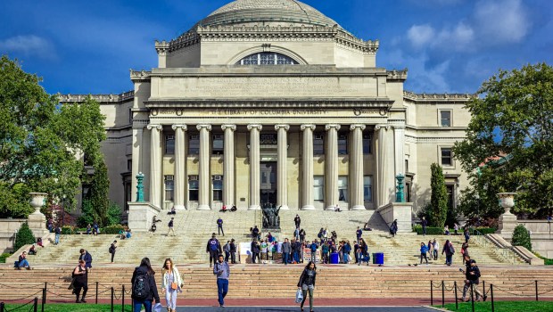 Students walk across campus at Columbia University in New York