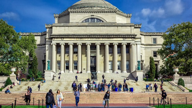 Students walk across campus at Columbia University in New York