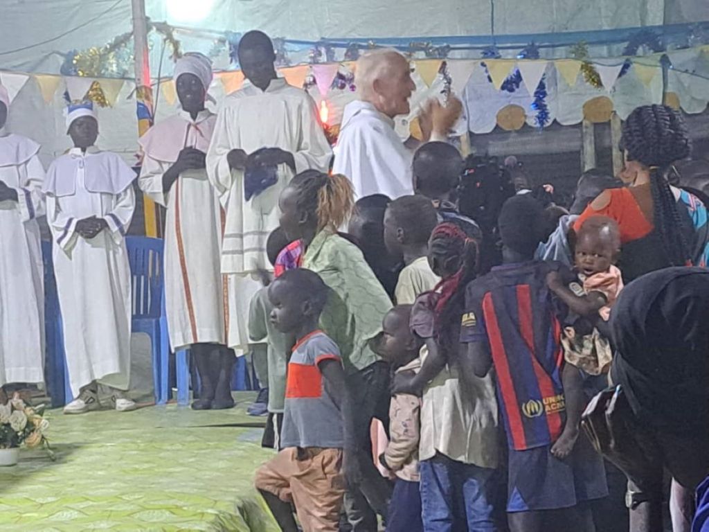 Father Michael Bassano during a mass in a camp in South Sudan