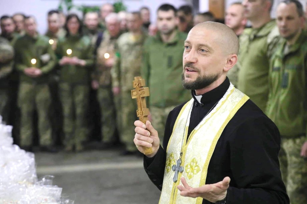 Fr. Andriy Zelinskyy blesses troops in Ukraine