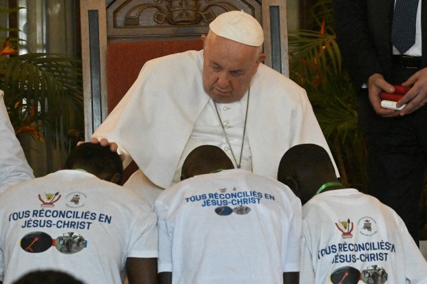 Pope-Francis-back-blesses-attendees-as-he-meets-with-victims-of-the-conflict-in-eastern-Democratic-Republic-of-Congo-AFP