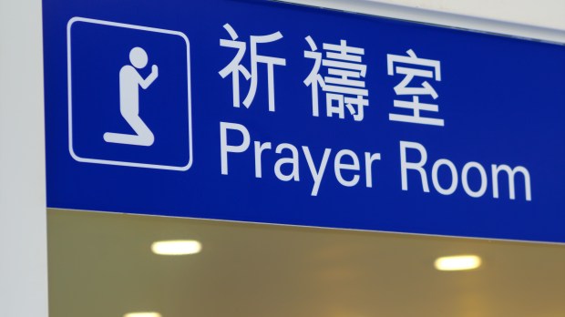 Sign announces airport chapel