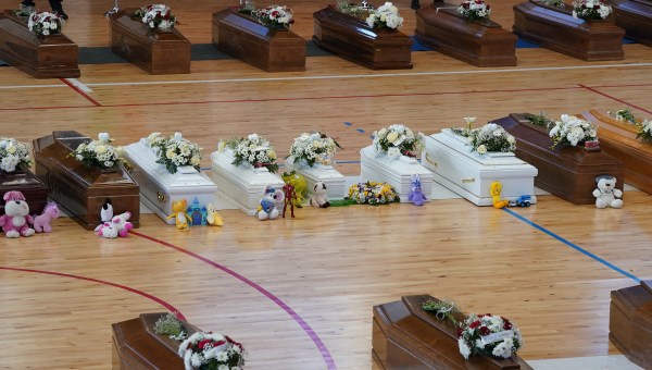 Coffins-containing-people-who-died-in-a-migrant-shipwreck-lie-in-state-at-Palasport-in-Crotone-Italy-AFP