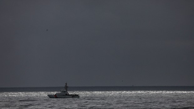 DA Coast Guard Cutter searches for survivors