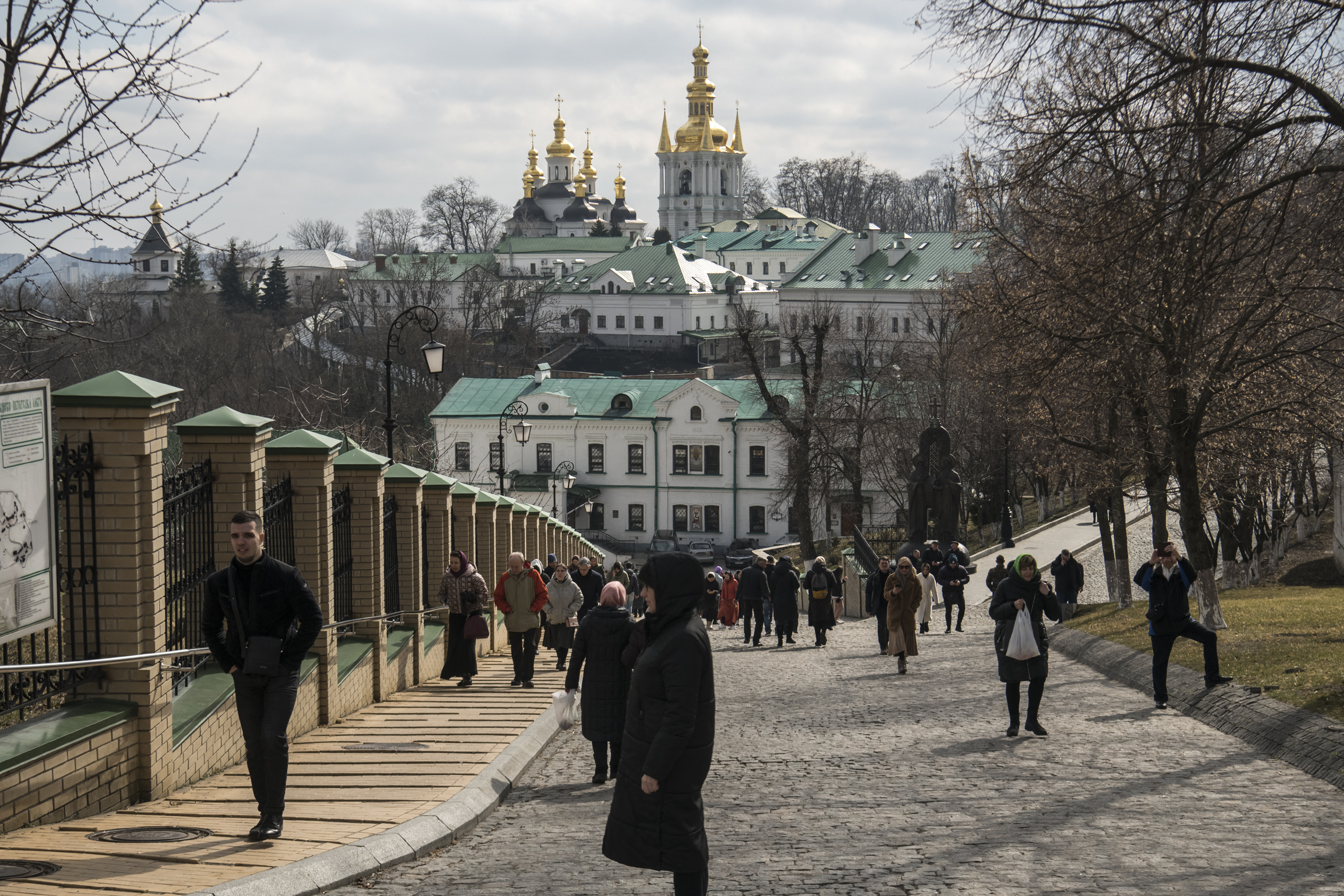 Pilgrims walk through Kyiv Monastery of the Caves complex