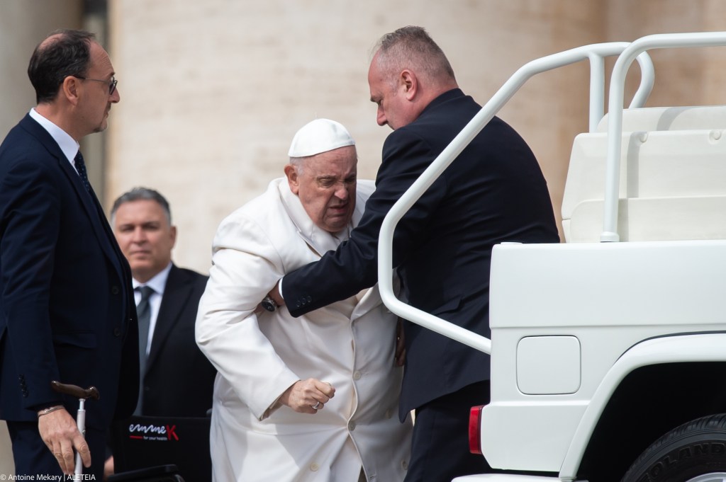 Pope hospitalized with respiratory infection 2 Pope Francis is helped get up the popemobile car as he leaves