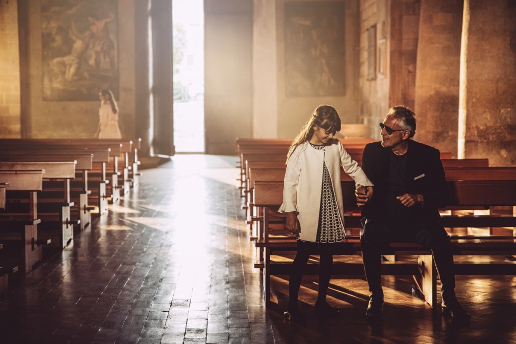 NOT FOR REUSE: Andrea Bocelli with daughter Virginia in church