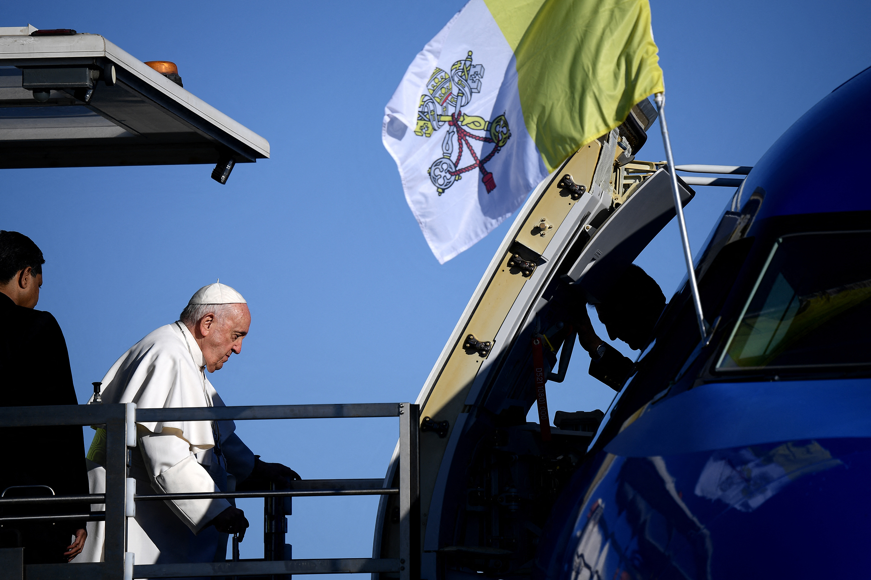 Pope Francis arrives at Rome's Fiumicino airport to board his plane for his trip to Hungary