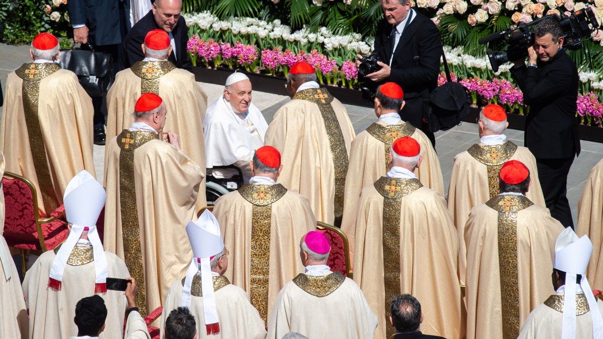 Pope Francis prays at the start of the Easter Sunday mass on April 9, 2023
