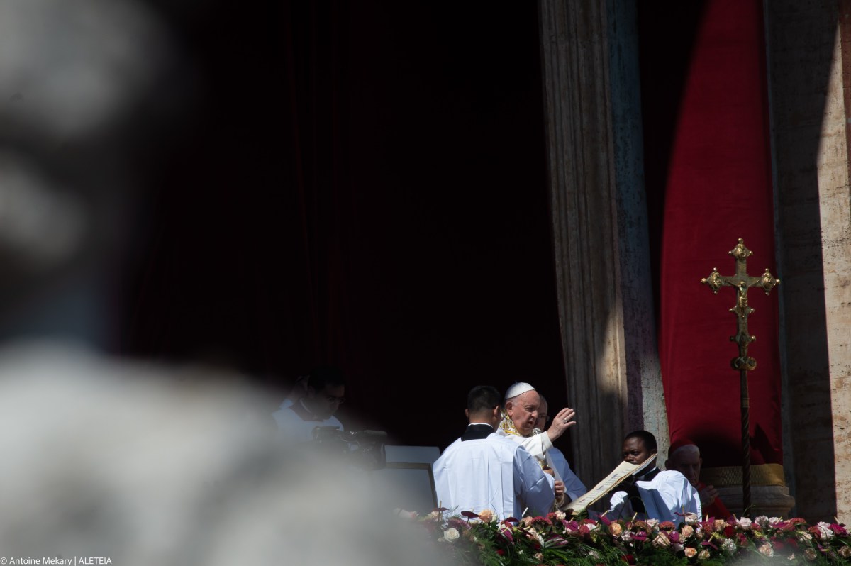 Pope Francis reads the Easter Urbi et Orbi message for Easter from the loggia of St. Peter's basilica