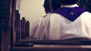 Seminarians sitting in pews at Mass