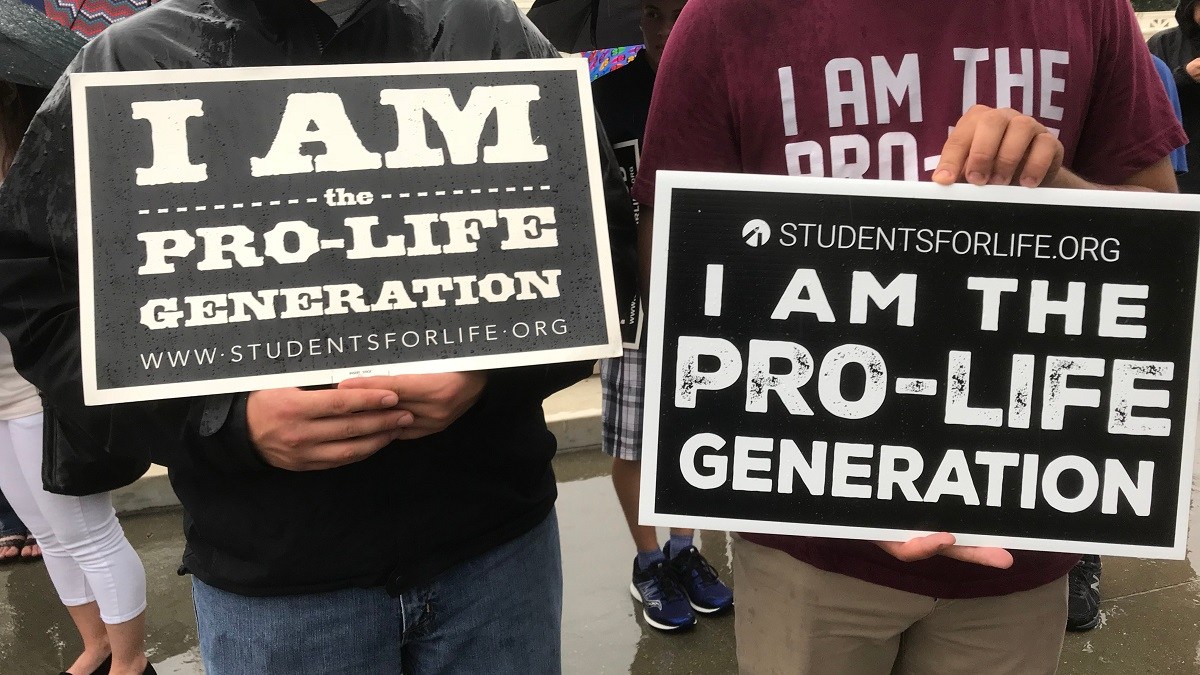 Two young men at a pro-life rally