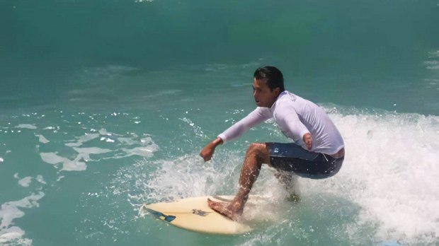 Venerable Guido Vidal França Schäffer surfing