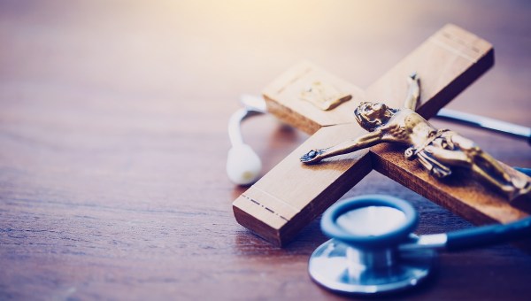 Crucifix with stethoscope
