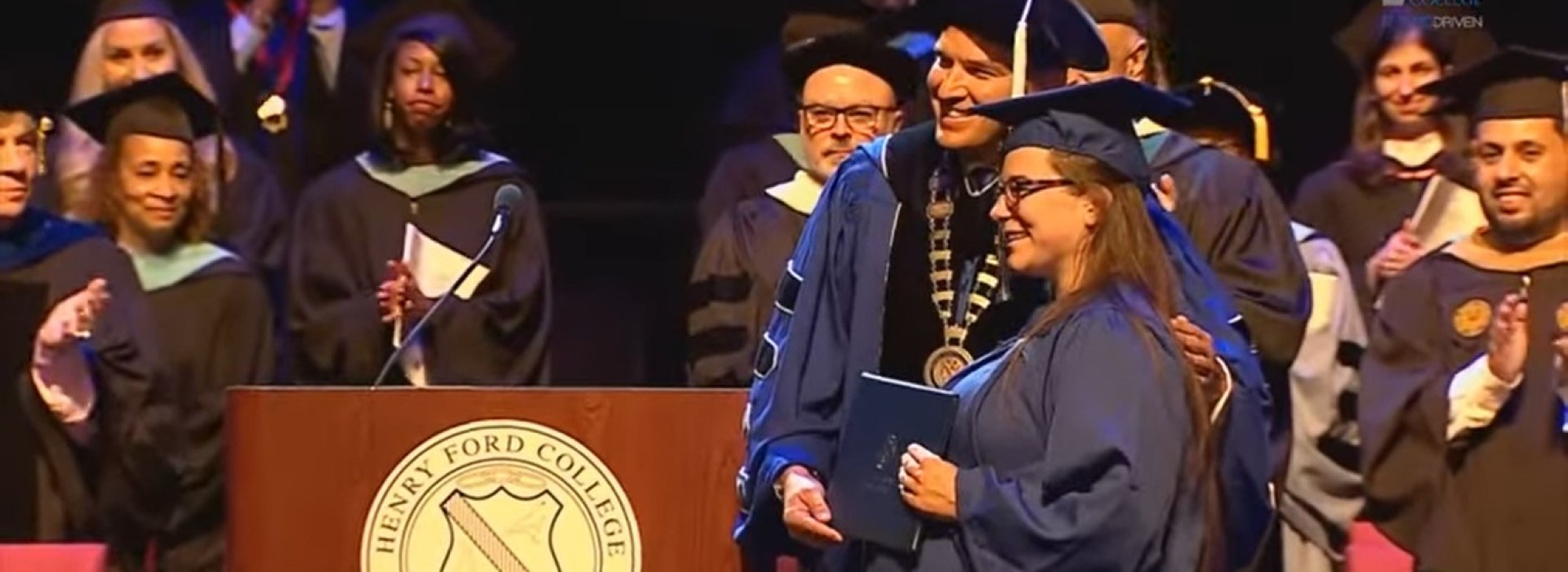 Pregnant woman graduate