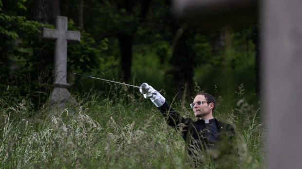 Fr. Franck Ruffiot practicing fencing