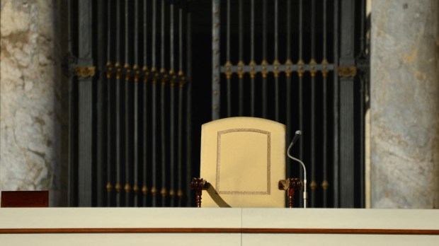 Empty papal chair in front of St. Peter's Basilica