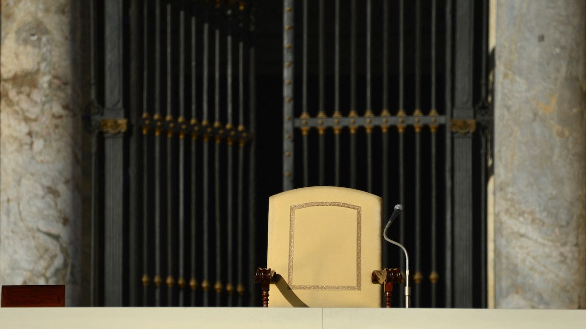 Empty papal chair in front of St. Peter's Basilica