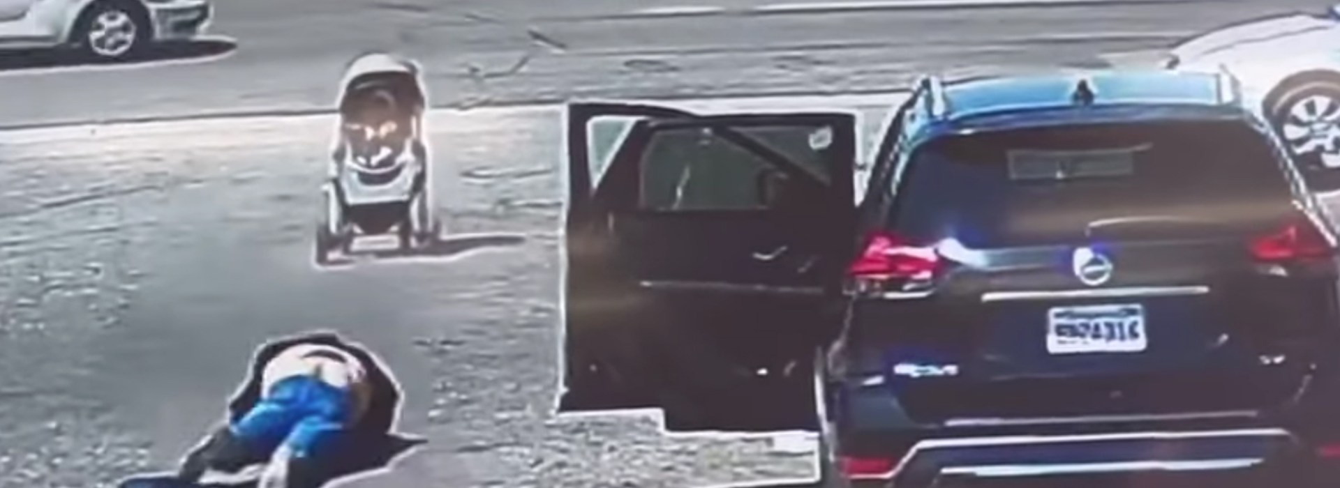 Stroller-with-a-baby-inside-gets-blown-by-the-wind-towards-the-street