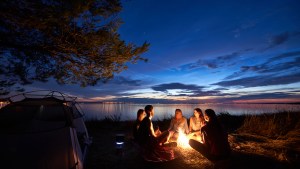 campfire lake sunset friends