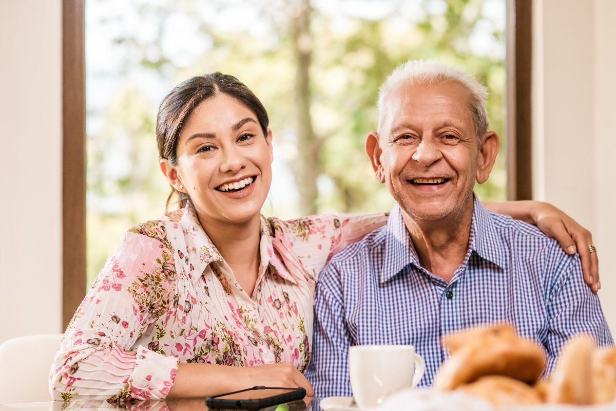 young-woman-elderly-man-smiling-happy