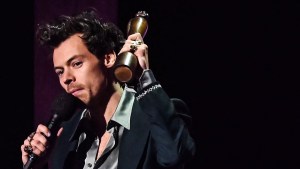 British singer Harry Styles celebrates after receiving the artist of the year award during BRIT Awards 2023