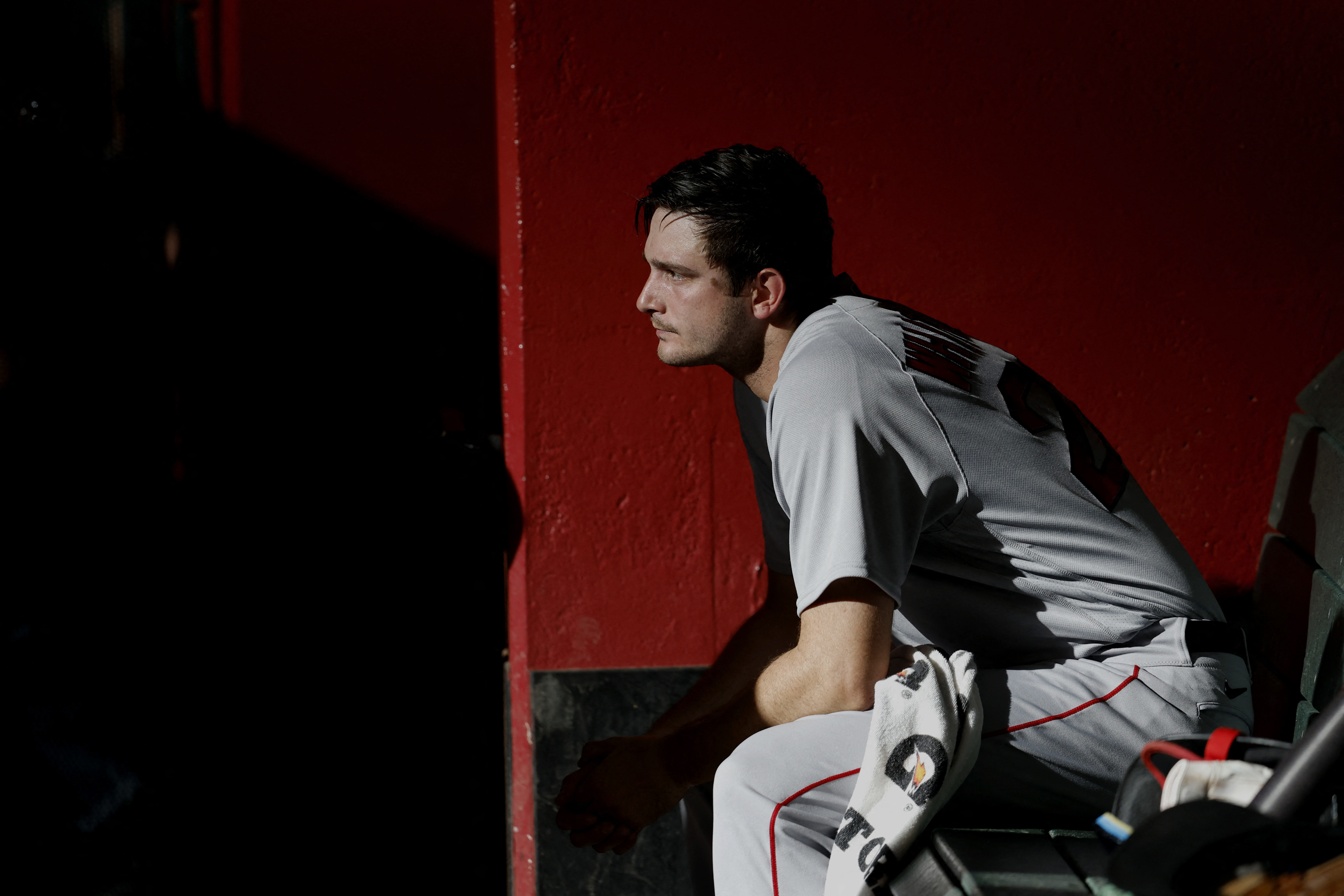 Garrett Whitlock #22 of the Boston Red Sox sits in the dugout