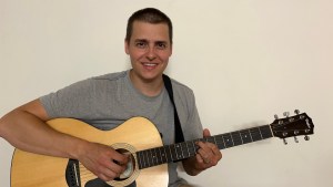 Jacob Rudd with guitar