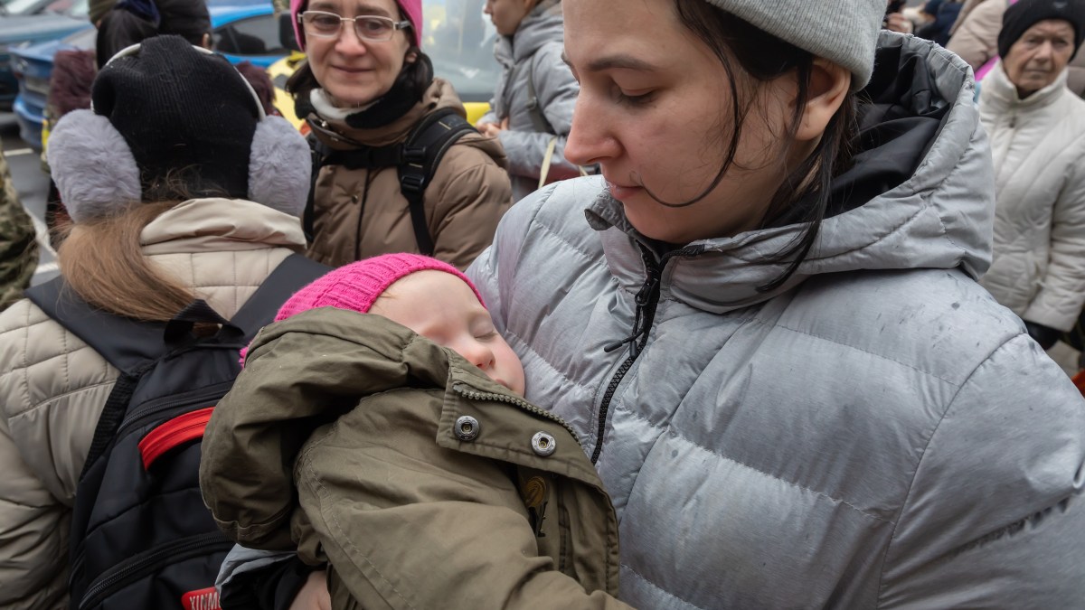 Ukrainian woman and child in war