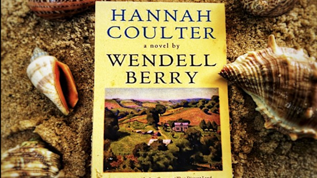 Hannah Coulter by Wendell Berry book on beach.