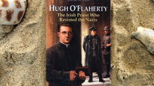 Book - Hugh O'Flaherty the Irish Priest Who Resisted the Nazis - on beach.