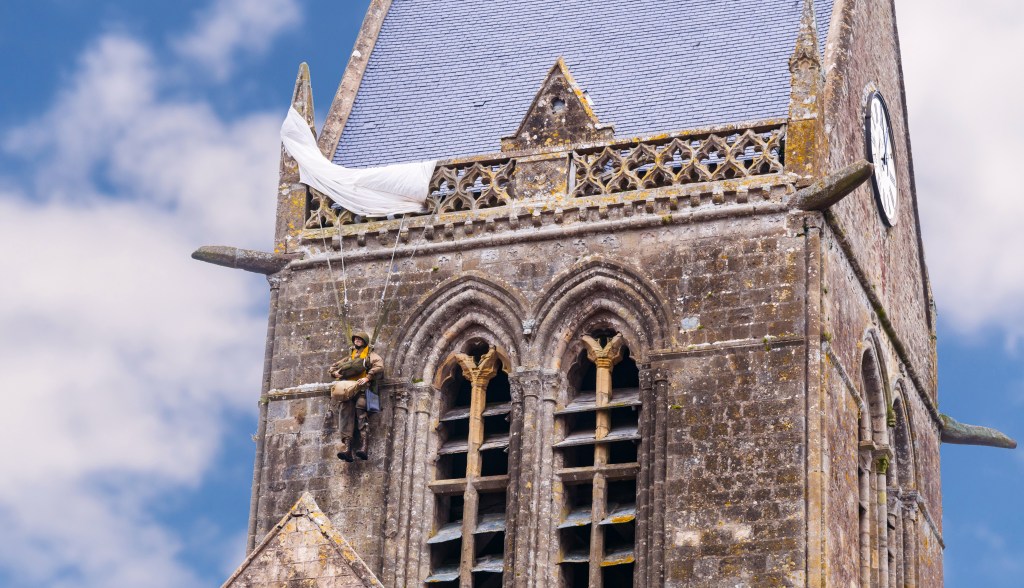 Mannequin Pvt John Steele hanging from church steeple